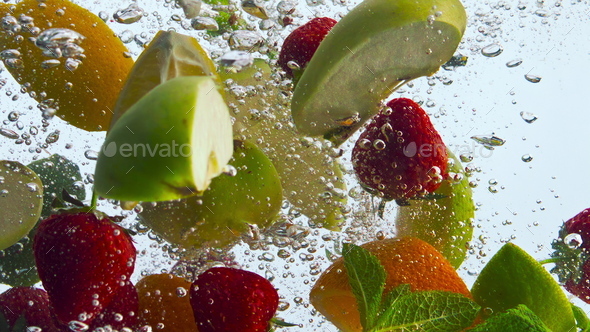 Closeup fruit submerged h2o on white history. Vitamin for nutritious nutrition